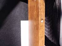 Screw holes in the crossbar, but no screws