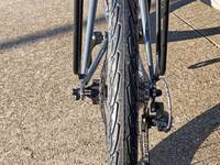 Rack attachment over rear hub
