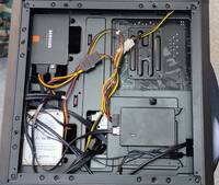 2.5" drives installed behind the motherboard tray