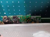 Unpopulated component video output next to the headphone and mic jacks